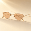 SAHARA — hero (gold metal / Warm Champagne Tan)
